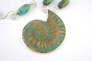 Turquoise-Fossil-with-Turquoise-beads-and-Coil-Links
