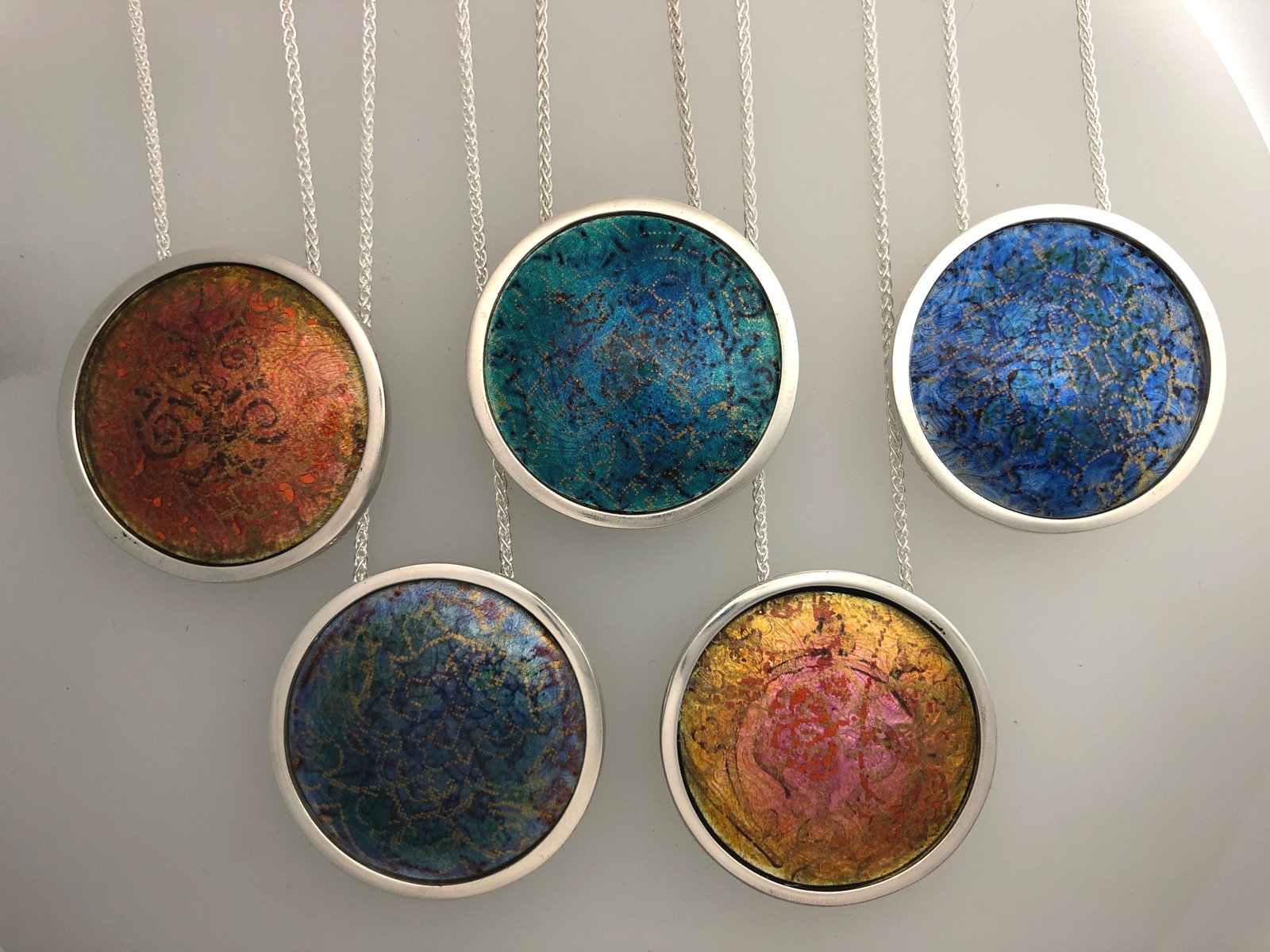 Indian Memories silver and enamel pendants inspired by saris and textiles